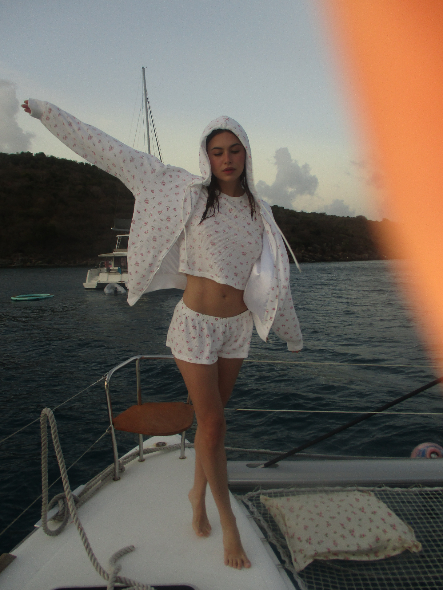 the set, worn on deck at golden hour